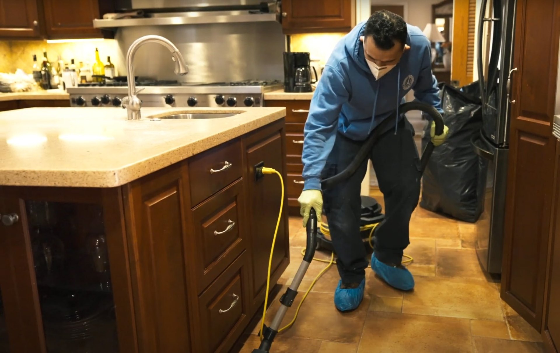 Professional technician using specialized equipment for water damage restoration